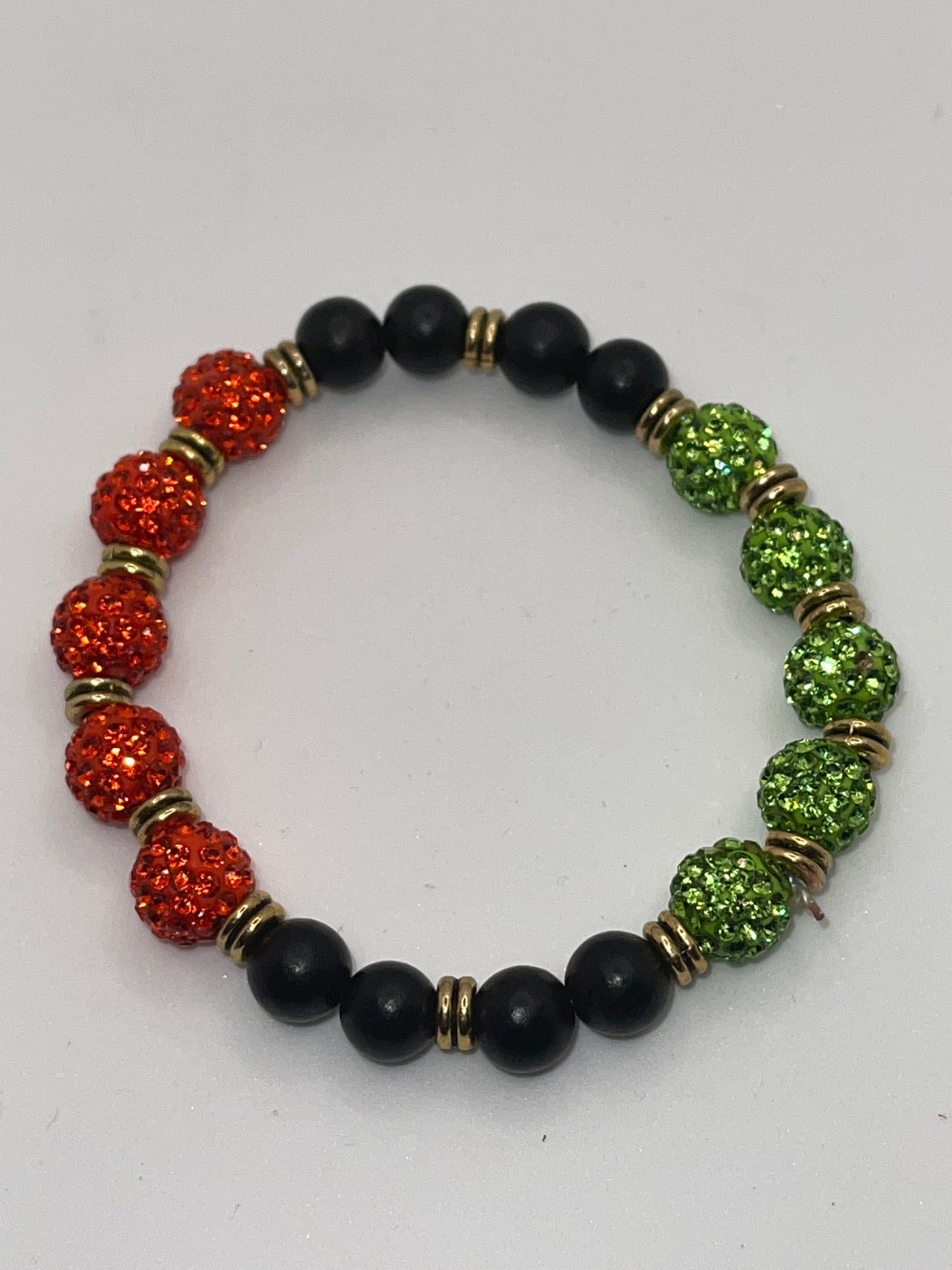 Red and Green bling beaded with black matte beads bracelet